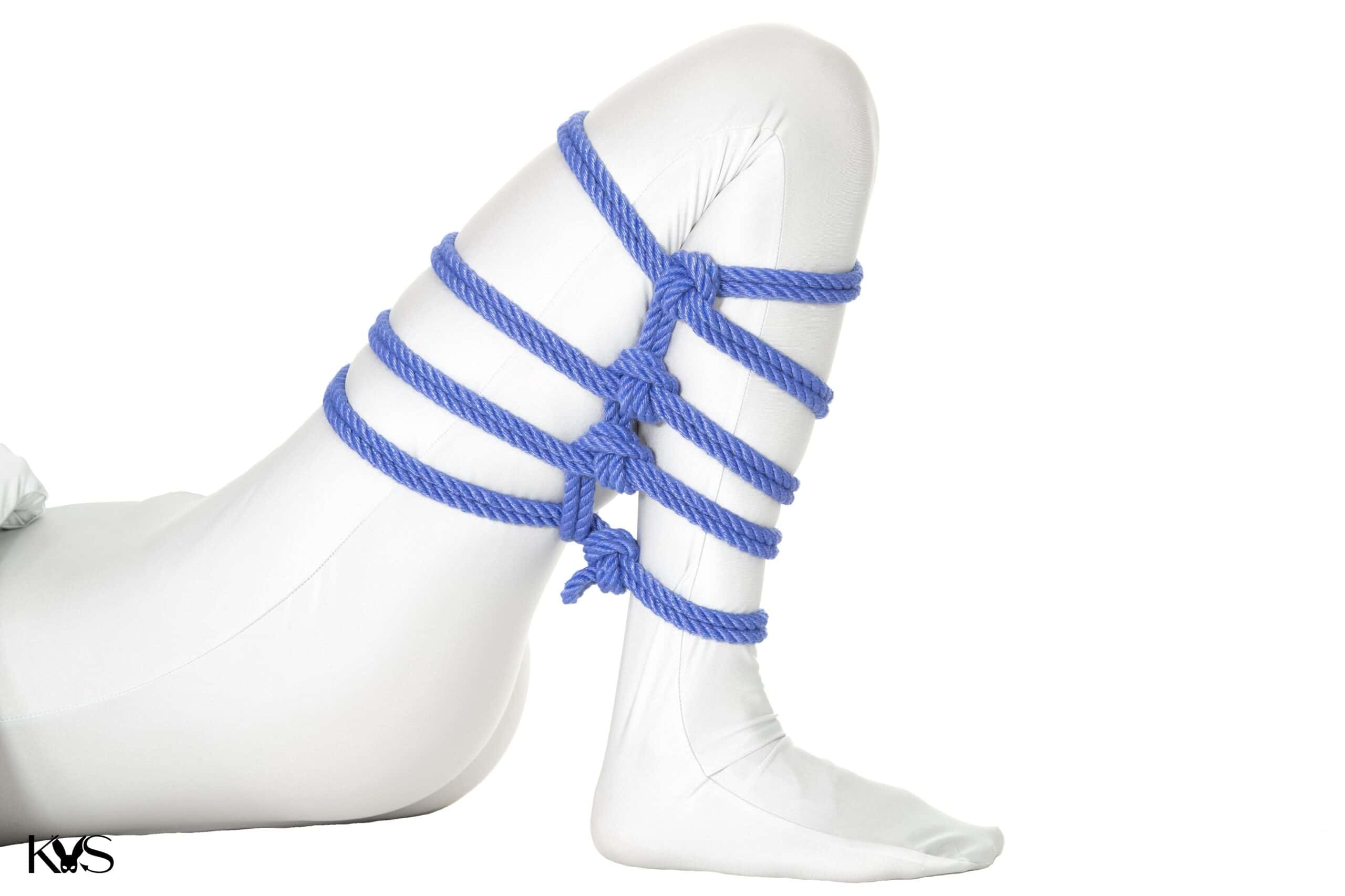Spiral futomomo leg tie technique used in rope bondage scenes